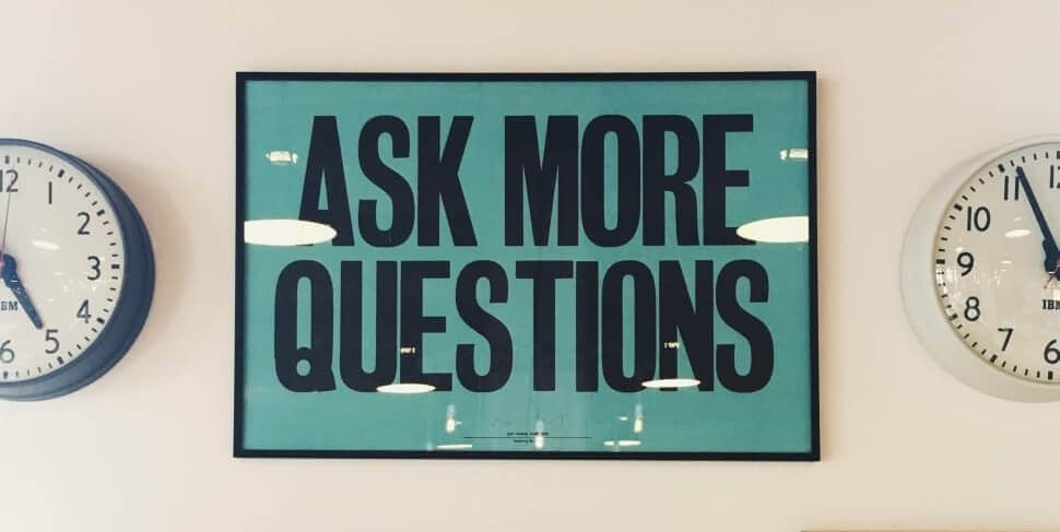 image of ask more questions sign